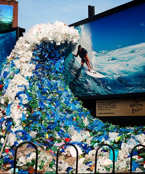 The 'Wave of Waste' London Sculpture shows a surfer riding a plastic pollution wave.